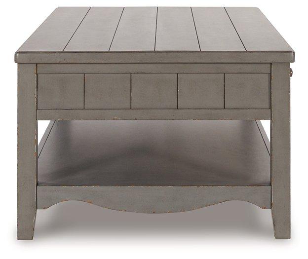 Charina Coffee Table - Premium Cocktail Table from Ashley Furniture - Just $280.92! Shop now at Furniture Wholesale Plus  We are the best furniture store in Nashville, Hendersonville, Goodlettsville, Madison, Antioch, Mount Juliet, Lebanon, Gallatin, Springfield, Murfreesboro, Franklin, Brentwood