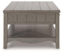 Charina Coffee Table - Premium Cocktail Table from Ashley Furniture - Just $280.92! Shop now at Furniture Wholesale Plus  We are the best furniture store in Nashville, Hendersonville, Goodlettsville, Madison, Antioch, Mount Juliet, Lebanon, Gallatin, Springfield, Murfreesboro, Franklin, Brentwood