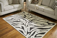 Thomwith 4'11" x 7'2" Rug - Premium Rug from Ashley Furniture - Just $120.37! Shop now at Furniture Wholesale Plus  We are the best furniture store in Nashville, Hendersonville, Goodlettsville, Madison, Antioch, Mount Juliet, Lebanon, Gallatin, Springfield, Murfreesboro, Franklin, Brentwood