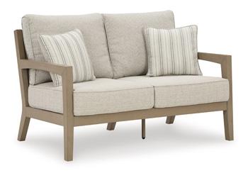 Hallow Creek Outdoor Loveseat with Cushion - Premium Outdoor Seating from Ashley Furniture - Just $1243.79! Shop now at Furniture Wholesale Plus  We are the best furniture store in Nashville, Hendersonville, Goodlettsville, Madison, Antioch, Mount Juliet, Lebanon, Gallatin, Springfield, Murfreesboro, Franklin, Brentwood