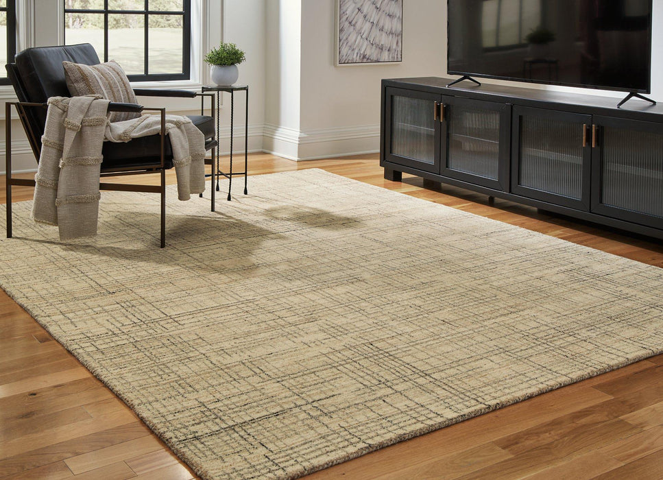 Janston Rug - Premium Rug Medium from Ashley Furniture - Just $175.10! Shop now at Furniture Wholesale Plus  We are the best furniture store in Nashville, Hendersonville, Goodlettsville, Madison, Antioch, Mount Juliet, Lebanon, Gallatin, Springfield, Murfreesboro, Franklin, Brentwood