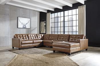 Baskove Sectional with Chaise - Premium Sectional from Ashley Furniture - Just $1667.12! Shop now at Furniture Wholesale Plus  We are the best furniture store in Nashville, Hendersonville, Goodlettsville, Madison, Antioch, Mount Juliet, Lebanon, Gallatin, Springfield, Murfreesboro, Franklin, Brentwood