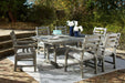 Visola Outdoor Dining Table with 6 Chairs - Premium Outdoor Seating Set from Ashley Furniture - Just $2437.45! Shop now at Furniture Wholesale Plus  We are the best furniture store in Nashville, Hendersonville, Goodlettsville, Madison, Antioch, Mount Juliet, Lebanon, Gallatin, Springfield, Murfreesboro, Franklin, Brentwood