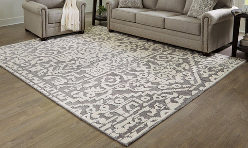 Oddetteley 7'10" x 10'1" Rug - Premium Rug from Ashley Furniture - Just $249.76! Shop now at Furniture Wholesale Plus  We are the best furniture store in Nashville, Hendersonville, Goodlettsville, Madison, Antioch, Mount Juliet, Lebanon, Gallatin, Springfield, Murfreesboro, Franklin, Brentwood