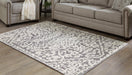 Oddetteley 4'11" x 7'2" Rug - Premium Rug from Ashley Furniture - Just $120.37! Shop now at Furniture Wholesale Plus  We are the best furniture store in Nashville, Hendersonville, Goodlettsville, Madison, Antioch, Mount Juliet, Lebanon, Gallatin, Springfield, Murfreesboro, Franklin, Brentwood