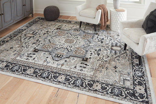 Gregmoore 7'7" x 9'11" Rug - Premium Rug from Ashley Furniture - Just $177.38! Shop now at Furniture Wholesale Plus  We are the best furniture store in Nashville, Hendersonville, Goodlettsville, Madison, Antioch, Mount Juliet, Lebanon, Gallatin, Springfield, Murfreesboro, Franklin, Brentwood