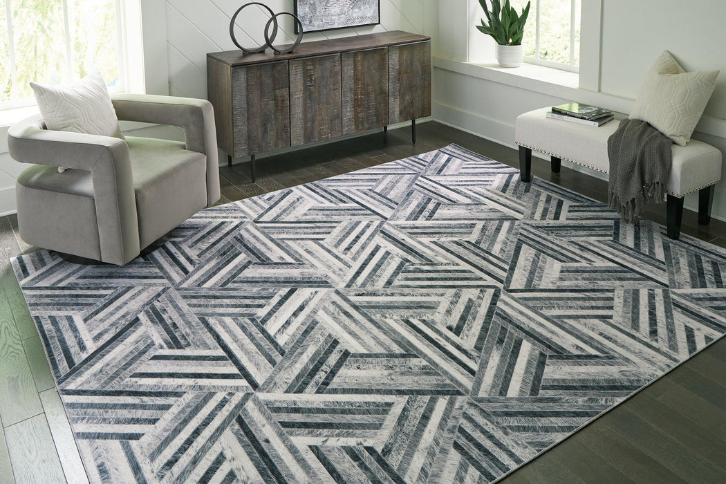 Adalock Rug - Premium Rug from Ashley Furniture - Just $69.18! Shop now at Furniture Wholesale Plus  We are the best furniture store in Nashville, Hendersonville, Goodlettsville, Madison, Antioch, Mount Juliet, Lebanon, Gallatin, Springfield, Murfreesboro, Franklin, Brentwood