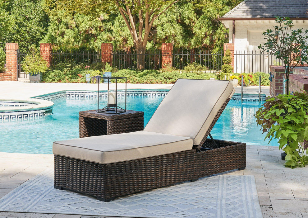 Coastline Bay Outdoor Chaise Lounge with Cushion - Premium Outdoor Seating from Ashley Furniture - Just $575.99! Shop now at Furniture Wholesale Plus  We are the best furniture store in Nashville, Hendersonville, Goodlettsville, Madison, Antioch, Mount Juliet, Lebanon, Gallatin, Springfield, Murfreesboro, Franklin, Brentwood