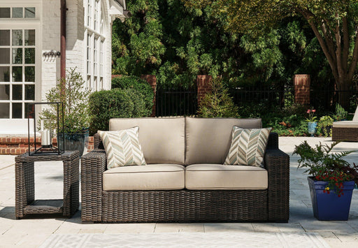 Coastline Bay Outdoor Loveseat with Cushion - Premium Outdoor Seating from Ashley Furniture - Just $970.15! Shop now at Furniture Wholesale Plus  We are the best furniture store in Nashville, Hendersonville, Goodlettsville, Madison, Antioch, Mount Juliet, Lebanon, Gallatin, Springfield, Murfreesboro, Franklin, Brentwood