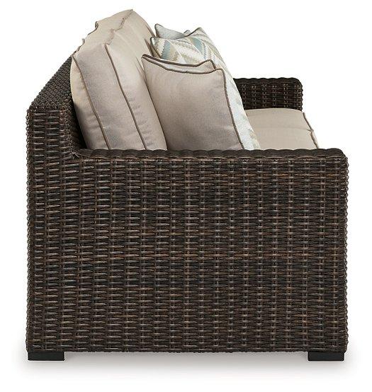 Coastline Bay Outdoor Sofa with Cushion - Premium Outdoor Seating from Ashley Furniture - Just $1274.27! Shop now at Furniture Wholesale Plus  We are the best furniture store in Nashville, Hendersonville, Goodlettsville, Madison, Antioch, Mount Juliet, Lebanon, Gallatin, Springfield, Murfreesboro, Franklin, Brentwood