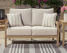 Hallow Creek Outdoor Loveseat with Cushion - Premium Outdoor Seating from Ashley Furniture - Just $1243.79! Shop now at Furniture Wholesale Plus  We are the best furniture store in Nashville, Hendersonville, Goodlettsville, Madison, Antioch, Mount Juliet, Lebanon, Gallatin, Springfield, Murfreesboro, Franklin, Brentwood