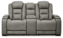 The Man-Den Power Reclining Loveseat with Console - Premium Loveseat from Ashley Furniture - Just $2152.97! Shop now at Furniture Wholesale Plus  We are the best furniture store in Nashville, Hendersonville, Goodlettsville, Madison, Antioch, Mount Juliet, Lebanon, Gallatin, Springfield, Murfreesboro, Franklin, Brentwood