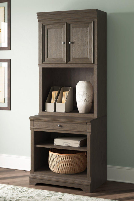 Janismore Bookcase - Premium Bookcase from Ashley Furniture - Just $746.13! Shop now at Furniture Wholesale Plus  We are the best furniture store in Nashville, Hendersonville, Goodlettsville, Madison, Antioch, Mount Juliet, Lebanon, Gallatin, Springfield, Murfreesboro, Franklin, Brentwood