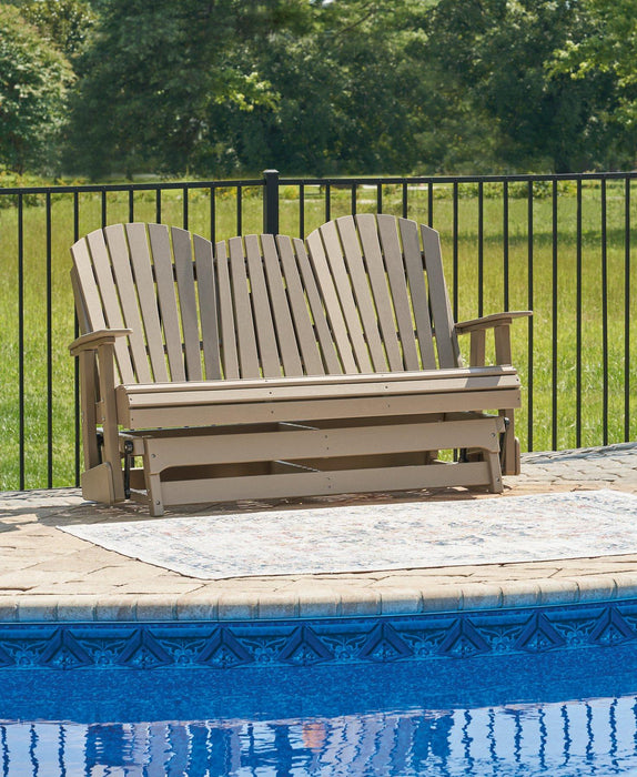 Hyland wave Outdoor Glider Loveseat - Premium Outdoor Seating from Ashley Furniture - Just $978.98! Shop now at Furniture Wholesale Plus  We are the best furniture store in Nashville, Hendersonville, Goodlettsville, Madison, Antioch, Mount Juliet, Lebanon, Gallatin, Springfield, Murfreesboro, Franklin, Brentwood