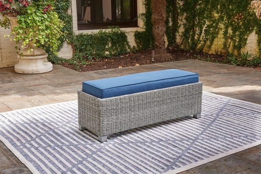 Naples Beach Outdoor Bench with Cushion - Premium Outdoor Seating from Ashley Furniture - Just $263.99! Shop now at Furniture Wholesale Plus  We are the best furniture store in Nashville, Hendersonville, Goodlettsville, Madison, Antioch, Mount Juliet, Lebanon, Gallatin, Springfield, Murfreesboro, Franklin, Brentwood