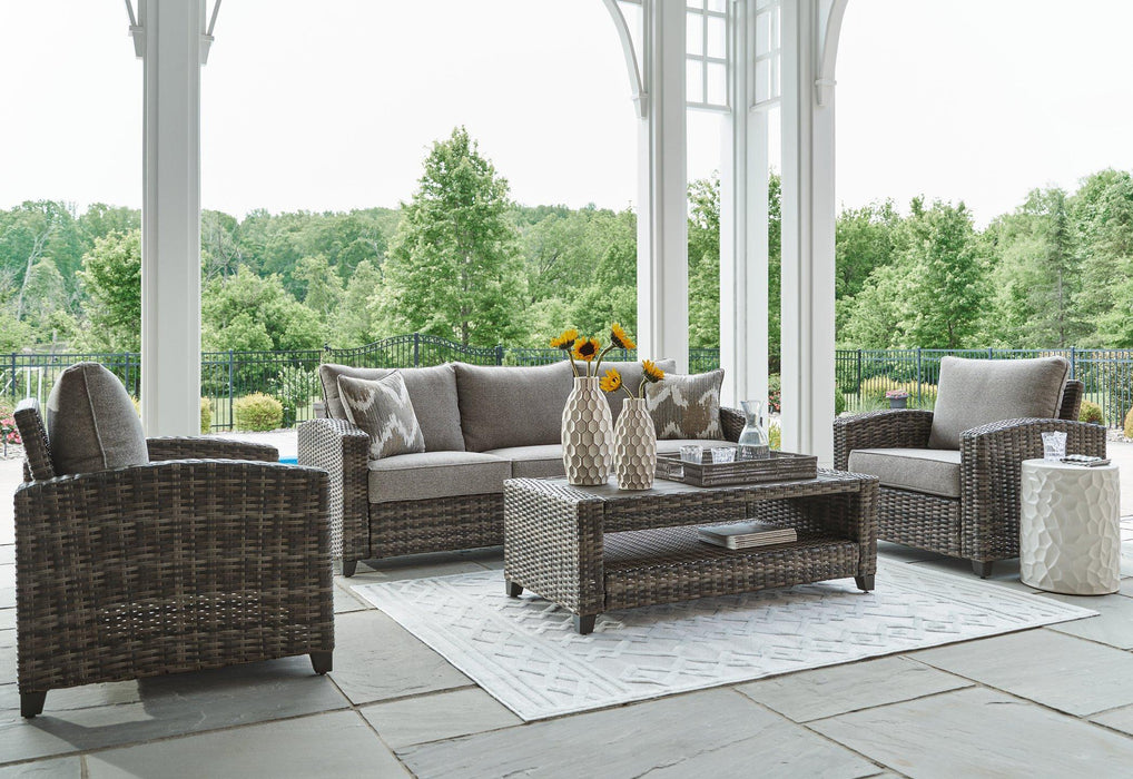 Oasis Court Outdoor Sofa/Chairs/Table Set (Set of 4) - Premium Outdoor Seating Set from Ashley Furniture - Just $1517.08! Shop now at Furniture Wholesale Plus  We are the best furniture store in Nashville, Hendersonville, Goodlettsville, Madison, Antioch, Mount Juliet, Lebanon, Gallatin, Springfield, Murfreesboro, Franklin, Brentwood