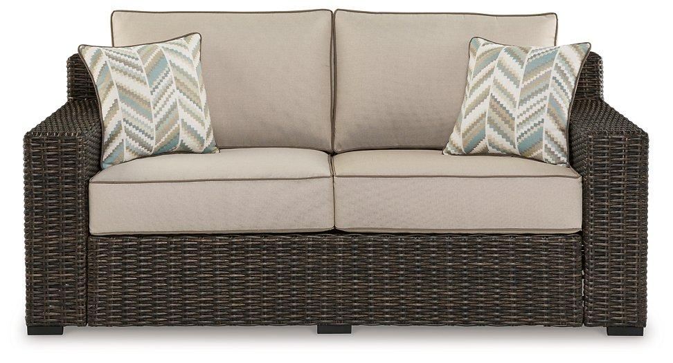 Coastline Bay Outdoor Loveseat with Cushion - Premium Outdoor Seating from Ashley Furniture - Just $970.15! Shop now at Furniture Wholesale Plus  We are the best furniture store in Nashville, Hendersonville, Goodlettsville, Madison, Antioch, Mount Juliet, Lebanon, Gallatin, Springfield, Murfreesboro, Franklin, Brentwood