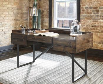 Starmore 63" Home Office Desk - Premium Desk from Ashley Furniture - Just $579.20! Shop now at Furniture Wholesale Plus  We are the best furniture store in Nashville, Hendersonville, Goodlettsville, Madison, Antioch, Mount Juliet, Lebanon, Gallatin, Springfield, Murfreesboro, Franklin, Brentwood