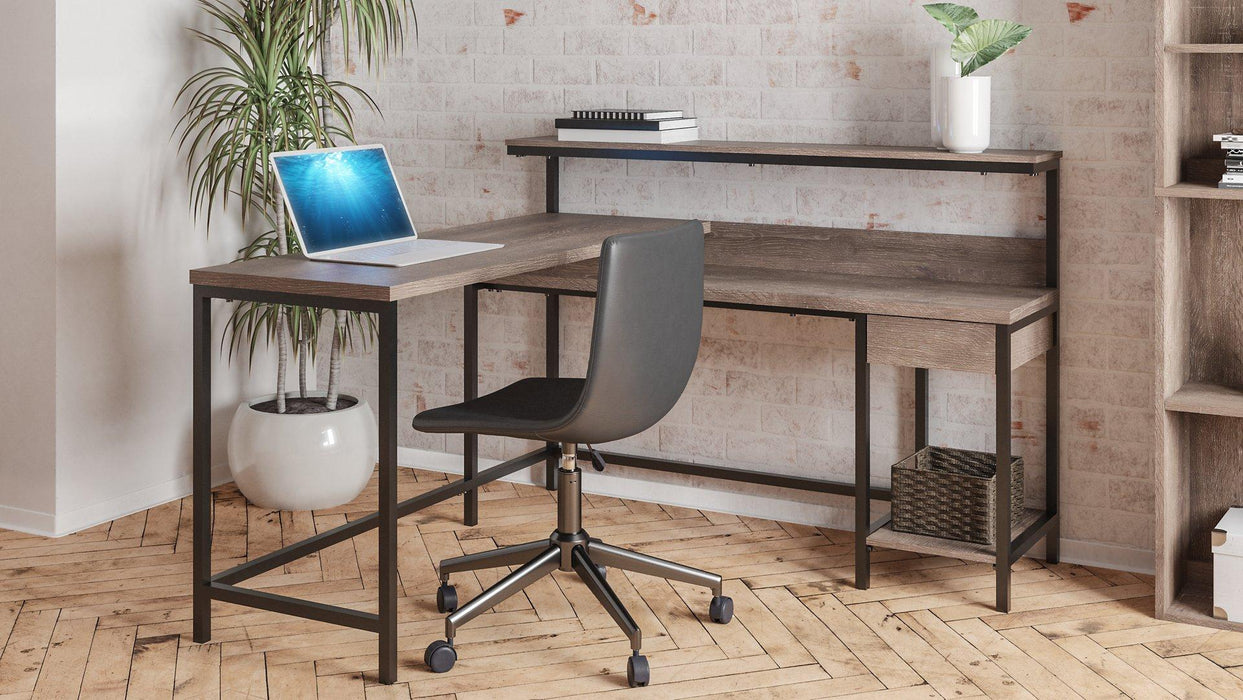 Arlenbry Home Office L-Desk with Storage - Premium Desk from Ashley Furniture - Just $393.16! Shop now at Furniture Wholesale Plus  We are the best furniture store in Nashville, Hendersonville, Goodlettsville, Madison, Antioch, Mount Juliet, Lebanon, Gallatin, Springfield, Murfreesboro, Franklin, Brentwood