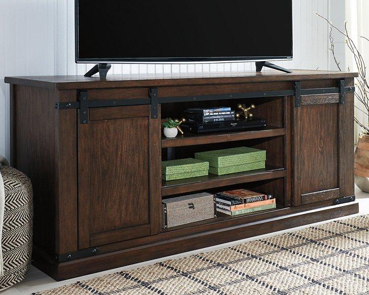 Budmore 70" TV Stand - Premium TV Stand from Ashley Furniture - Just $641.55! Shop now at Furniture Wholesale Plus  We are the best furniture store in Nashville, Hendersonville, Goodlettsville, Madison, Antioch, Mount Juliet, Lebanon, Gallatin, Springfield, Murfreesboro, Franklin, Brentwood