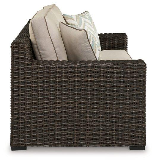 Coastline Bay Outdoor Loveseat with Cushion - Premium Outdoor Seating from Ashley Furniture - Just $970.15! Shop now at Furniture Wholesale Plus  We are the best furniture store in Nashville, Hendersonville, Goodlettsville, Madison, Antioch, Mount Juliet, Lebanon, Gallatin, Springfield, Murfreesboro, Franklin, Brentwood