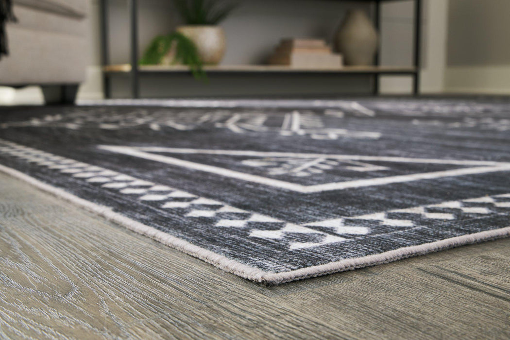 Arloman Rug - Premium Rug from Ashley Furniture - Just $134.50! Shop now at Furniture Wholesale Plus  We are the best furniture store in Nashville, Hendersonville, Goodlettsville, Madison, Antioch, Mount Juliet, Lebanon, Gallatin, Springfield, Murfreesboro, Franklin, Brentwood