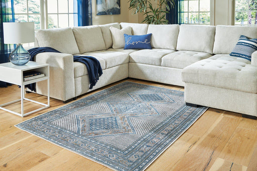 Landler 5'2" x 7'1" Rug - Premium Rug from Ashley Furniture - Just $129.20! Shop now at Furniture Wholesale Plus  We are the best furniture store in Nashville, Hendersonville, Goodlettsville, Madison, Antioch, Mount Juliet, Lebanon, Gallatin, Springfield, Murfreesboro, Franklin, Brentwood