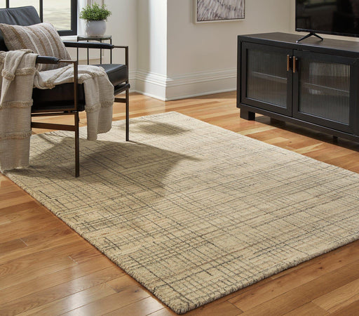 Janston Rug - Premium Rug Medium from Ashley Furniture - Just $175.10! Shop now at Furniture Wholesale Plus  We are the best furniture store in Nashville, Hendersonville, Goodlettsville, Madison, Antioch, Mount Juliet, Lebanon, Gallatin, Springfield, Murfreesboro, Franklin, Brentwood