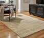 Janston Rug - Premium Rug Medium from Ashley Furniture - Just $175.10! Shop now at Furniture Wholesale Plus  We are the best furniture store in Nashville, Hendersonville, Goodlettsville, Madison, Antioch, Mount Juliet, Lebanon, Gallatin, Springfield, Murfreesboro, Franklin, Brentwood