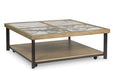 Montia Coffee Table - Premium Cocktail Table from Ashley Furniture - Just $552.79! Shop now at Furniture Wholesale Plus  We are the best furniture store in Nashville, Hendersonville, Goodlettsville, Madison, Antioch, Mount Juliet, Lebanon, Gallatin, Springfield, Murfreesboro, Franklin, Brentwood