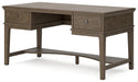 Janismore Home Office Storage Leg Desk - Premium Desk from Ashley Furniture - Just $579.20! Shop now at Furniture Wholesale Plus  We are the best furniture store in Nashville, Hendersonville, Goodlettsville, Madison, Antioch, Mount Juliet, Lebanon, Gallatin, Springfield, Murfreesboro, Franklin, Brentwood