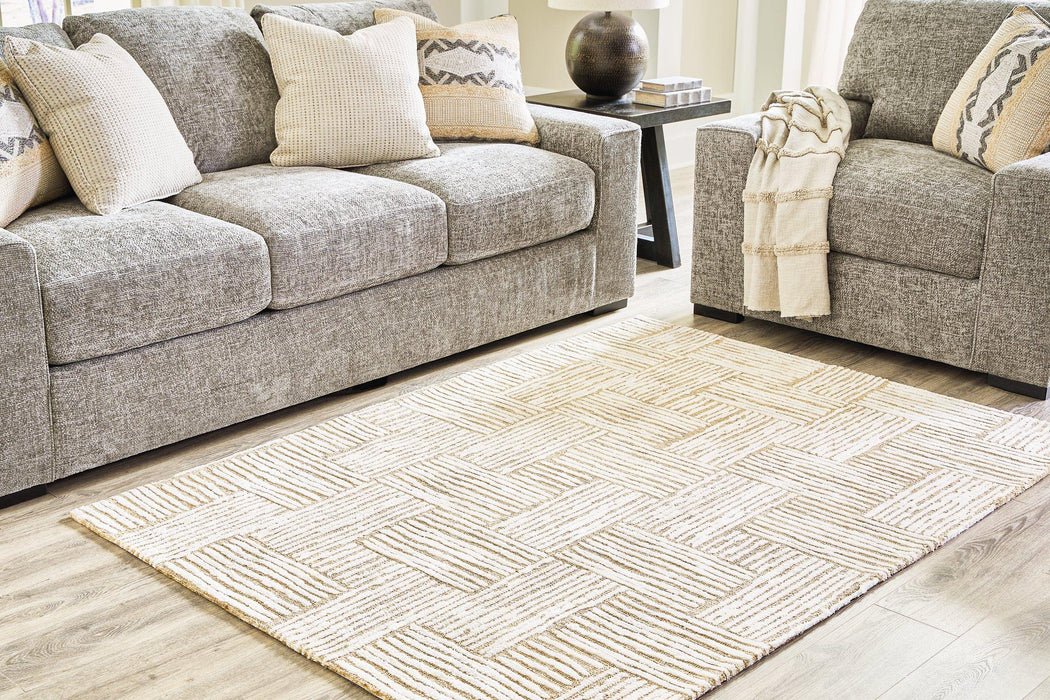 Adanmund 5' x 7' Rug - Premium Rug from Ashley Furniture - Just $138.03! Shop now at Furniture Wholesale Plus  We are the best furniture store in Nashville, Hendersonville, Goodlettsville, Madison, Antioch, Mount Juliet, Lebanon, Gallatin, Springfield, Murfreesboro, Franklin, Brentwood