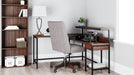 Camiburg Home Office L-Desk with Storage - Premium Desk from Ashley Furniture - Just $317.24! Shop now at Furniture Wholesale Plus  We are the best furniture store in Nashville, Hendersonville, Goodlettsville, Madison, Antioch, Mount Juliet, Lebanon, Gallatin, Springfield, Murfreesboro, Franklin, Brentwood