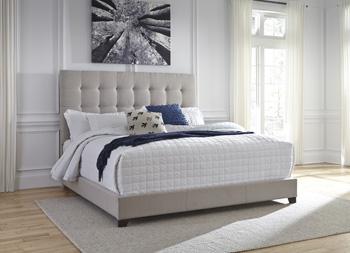 Dolante Upholstered Bed - Premium Bed from Ashley Furniture - Just $311.73! Shop now at Furniture Wholesale Plus  We are the best furniture store in Nashville, Hendersonville, Goodlettsville, Madison, Antioch, Mount Juliet, Lebanon, Gallatin, Springfield, Murfreesboro, Franklin, Brentwood