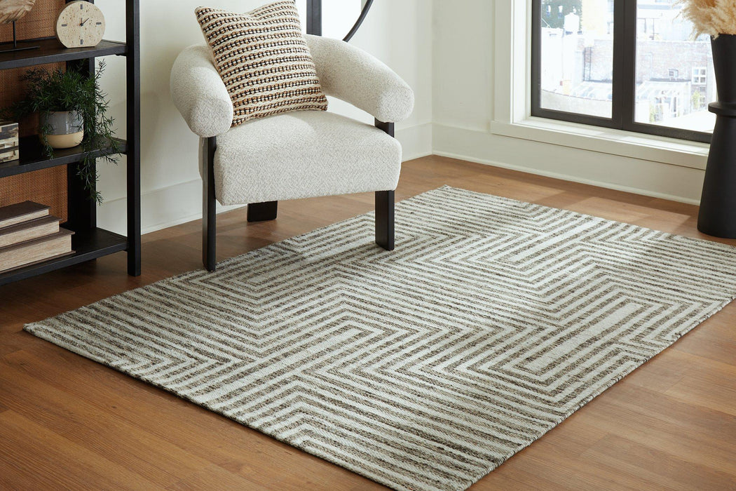 Jossen Rug - Premium Rug Medium from Ashley Furniture - Just $175.10! Shop now at Furniture Wholesale Plus  We are the best furniture store in Nashville, Hendersonville, Goodlettsville, Madison, Antioch, Mount Juliet, Lebanon, Gallatin, Springfield, Murfreesboro, Franklin, Brentwood