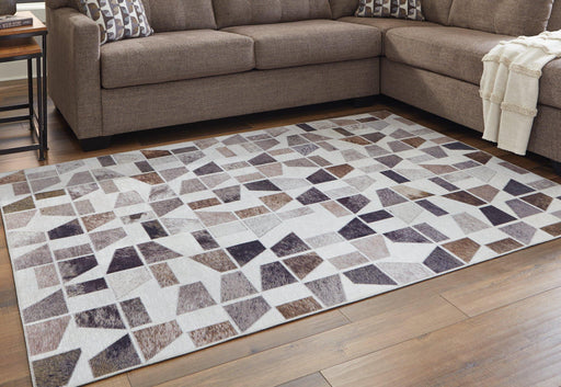 Jettner 5' x 7' Rug - Premium Rug from Ashley Furniture - Just $69.18! Shop now at Furniture Wholesale Plus  We are the best furniture store in Nashville, Hendersonville, Goodlettsville, Madison, Antioch, Mount Juliet, Lebanon, Gallatin, Springfield, Murfreesboro, Franklin, Brentwood