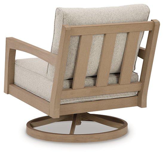 Hallow Creek Outdoor Swivel Lounge with Cushion - Premium Outdoor Seating from Ashley Furniture - Just $711.93! Shop now at Furniture Wholesale Plus  We are the best furniture store in Nashville, Hendersonville, Goodlettsville, Madison, Antioch, Mount Juliet, Lebanon, Gallatin, Springfield, Murfreesboro, Franklin, Brentwood