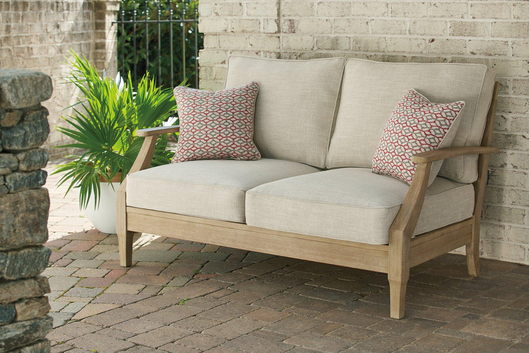 Clare View Loveseat with Cushion - Premium Outdoor Seating from Ashley Furniture - Just $698.28! Shop now at Furniture Wholesale Plus  We are the best furniture store in Nashville, Hendersonville, Goodlettsville, Madison, Antioch, Mount Juliet, Lebanon, Gallatin, Springfield, Murfreesboro, Franklin, Brentwood