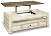 Realyn Coffee Table with Lift Top - Premium Cocktail Table Lift from Ashley Furniture - Just $333.88! Shop now at Furniture Wholesale Plus  We are the best furniture store in Nashville, Hendersonville, Goodlettsville, Madison, Antioch, Mount Juliet, Lebanon, Gallatin, Springfield, Murfreesboro, Franklin, Brentwood