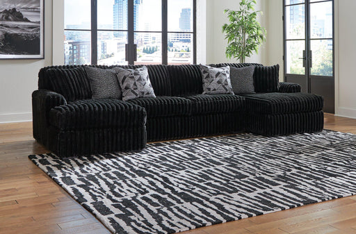 Midnight-Madness Sectional with Chaise - Premium Sectional from Ashley Furniture - Just $1572.08! Shop now at Furniture Wholesale Plus  We are the best furniture store in Nashville, Hendersonville, Goodlettsville, Madison, Antioch, Mount Juliet, Lebanon, Gallatin, Springfield, Murfreesboro, Franklin, Brentwood