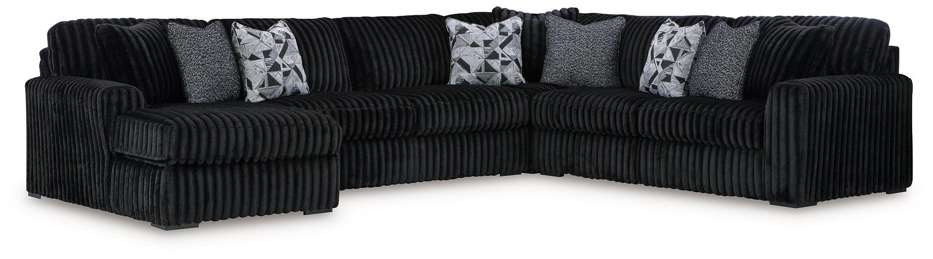 Midnight-Madness Sectional with Chaise - Premium Sectional from Ashley Furniture - Just $1572.08! Shop now at Furniture Wholesale Plus  We are the best furniture store in Nashville, Hendersonville, Goodlettsville, Madison, Antioch, Mount Juliet, Lebanon, Gallatin, Springfield, Murfreesboro, Franklin, Brentwood