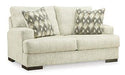 Caretti Loveseat - Premium Loveseat from Ashley Furniture - Just $660.55! Shop now at Furniture Wholesale Plus  We are the best furniture store in Nashville, Hendersonville, Goodlettsville, Madison, Antioch, Mount Juliet, Lebanon, Gallatin, Springfield, Murfreesboro, Franklin, Brentwood