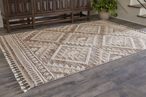 Odedale 5' x 7' Rug - Premium Rug from Ashley Furniture - Just $160.98! Shop now at Furniture Wholesale Plus  We are the best furniture store in Nashville, Hendersonville, Goodlettsville, Madison, Antioch, Mount Juliet, Lebanon, Gallatin, Springfield, Murfreesboro, Franklin, Brentwood