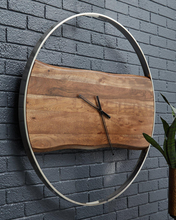 Panchali Wall Clock - Premium Clock from Ashley Furniture - Just $192.76! Shop now at Furniture Wholesale Plus  We are the best furniture store in Nashville, Hendersonville, Goodlettsville, Madison, Antioch, Mount Juliet, Lebanon, Gallatin, Springfield, Murfreesboro, Franklin, Brentwood