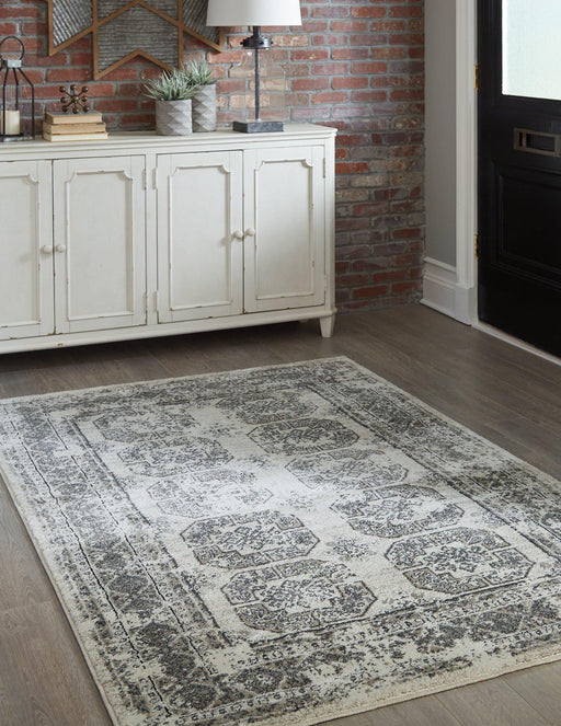 Jirou 5' x 7'6" Rug - Premium Rug from Ashley Furniture - Just $125.67! Shop now at Furniture Wholesale Plus  We are the best furniture store in Nashville, Hendersonville, Goodlettsville, Madison, Antioch, Mount Juliet, Lebanon, Gallatin, Springfield, Murfreesboro, Franklin, Brentwood