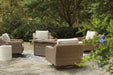 Beachcroft Beachcroft Fire Pit Table with Four Nuvella Swivel Lounge Chairs - Premium Outdoor Seating Set from Ashley Furniture - Just $4022.76! Shop now at Furniture Wholesale Plus  We are the best furniture store in Nashville, Hendersonville, Goodlettsville, Madison, Antioch, Mount Juliet, Lebanon, Gallatin, Springfield, Murfreesboro, Franklin, Brentwood