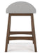 Lyncott Counter Height Bar Stool - Premium Barstool from Ashley Furniture - Just $92.51! Shop now at Furniture Wholesale Plus  We are the best furniture store in Nashville, Hendersonville, Goodlettsville, Madison, Antioch, Mount Juliet, Lebanon, Gallatin, Springfield, Murfreesboro, Franklin, Brentwood