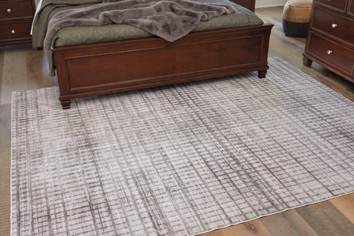 Moorhill 7'5" x 9'6" Rug - Premium Rug from Ashley Furniture - Just $278.01! Shop now at Furniture Wholesale Plus  We are the best furniture store in Nashville, Hendersonville, Goodlettsville, Madison, Antioch, Mount Juliet, Lebanon, Gallatin, Springfield, Murfreesboro, Franklin, Brentwood