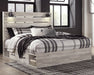 Cambeck Bed with 4 Storage Drawers - Premium Bed from Ashley Furniture - Just $782.35! Shop now at Furniture Wholesale Plus  We are the best furniture store in Nashville, Hendersonville, Goodlettsville, Madison, Antioch, Mount Juliet, Lebanon, Gallatin, Springfield, Murfreesboro, Franklin, Brentwood