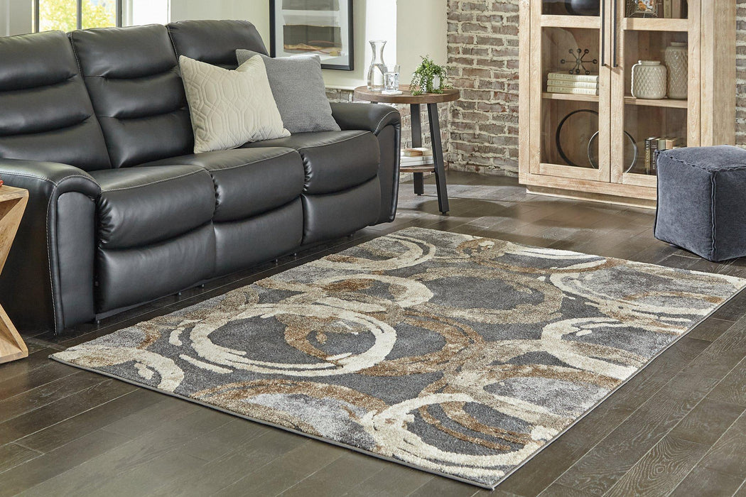 Faelyn 5' x 7'3" Rug - Premium Rug from Ashley Furniture - Just $178.63! Shop now at Furniture Wholesale Plus  We are the best furniture store in Nashville, Hendersonville, Goodlettsville, Madison, Antioch, Mount Juliet, Lebanon, Gallatin, Springfield, Murfreesboro, Franklin, Brentwood